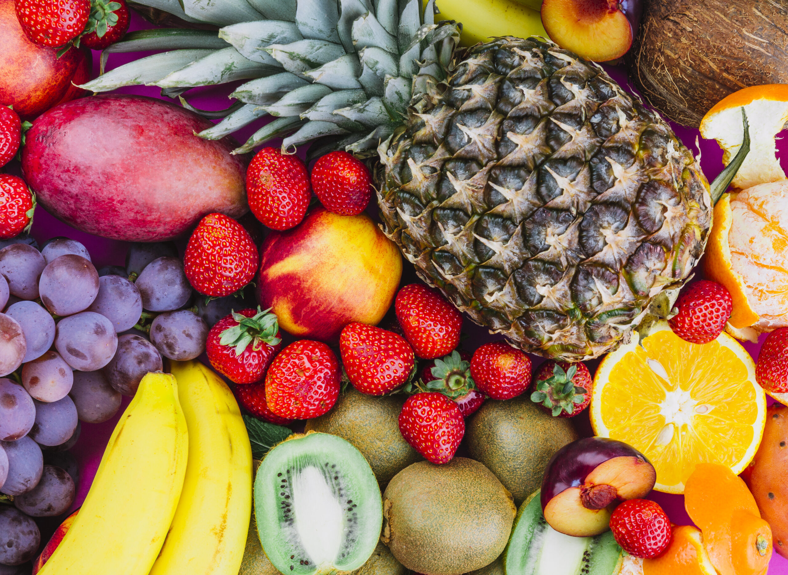 Grapes strawberries pineapple kiwi apricot banana whole pineapple